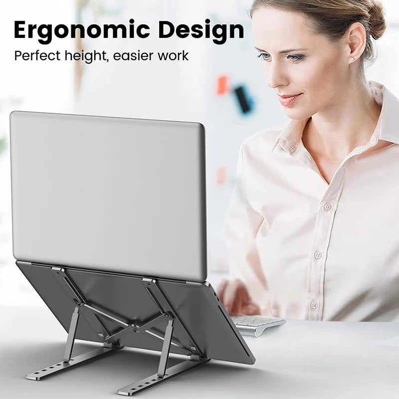 Person using a laptop on the Nexova Aluminum Laptop Stand