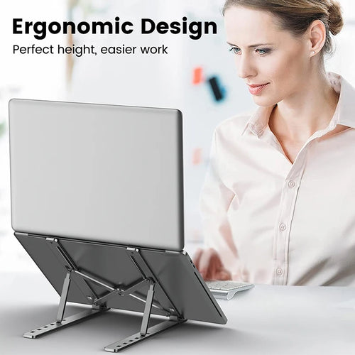 Person using a laptop on the Nexova Aluminum Laptop Stand